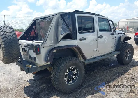 2010 Jeep Wrangler Unlimited Sahara из США, поврежденный, VIN 1J4HA5H15AL208413
